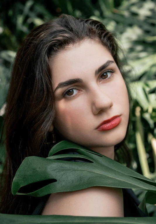 an image of a beautiful woman in a green dress