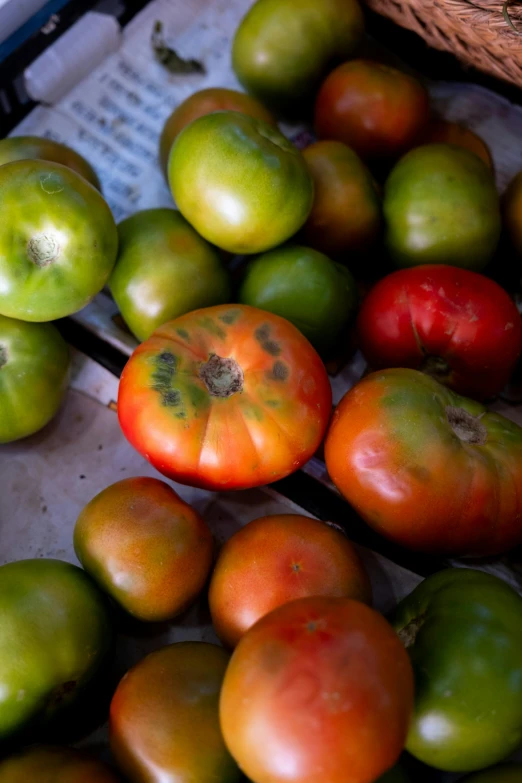 many different types of fruit and vegetables in a basket