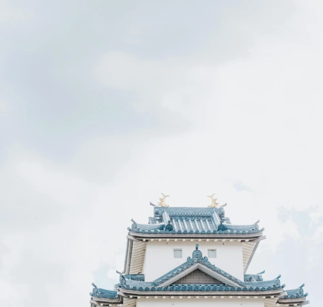 tall buildings with a few small blue roof tops