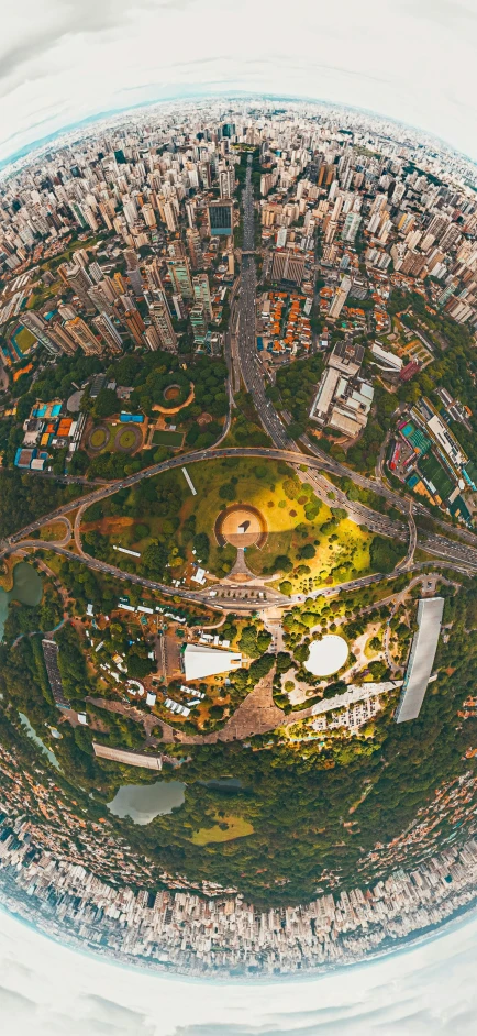 aerial view of large city with city park