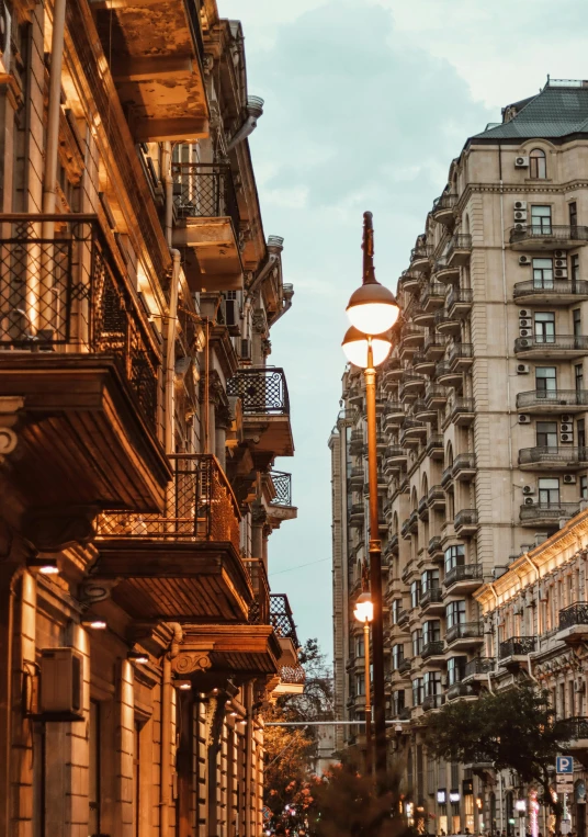 a street light that is sitting in the middle of buildings