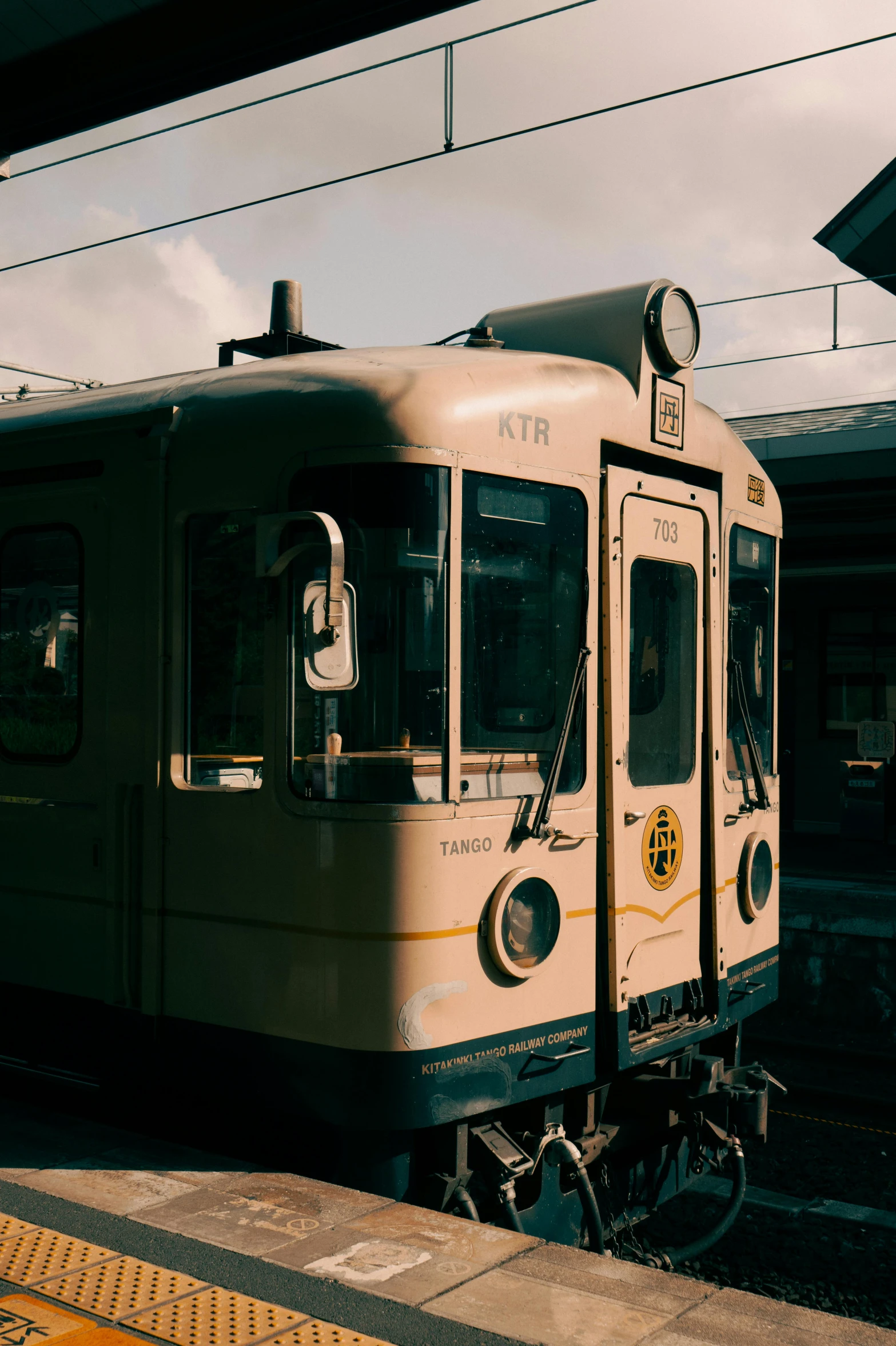 a train parked next to a train station