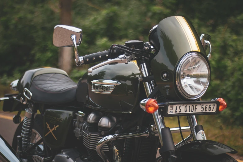 a motorcycle that is parked next to a road