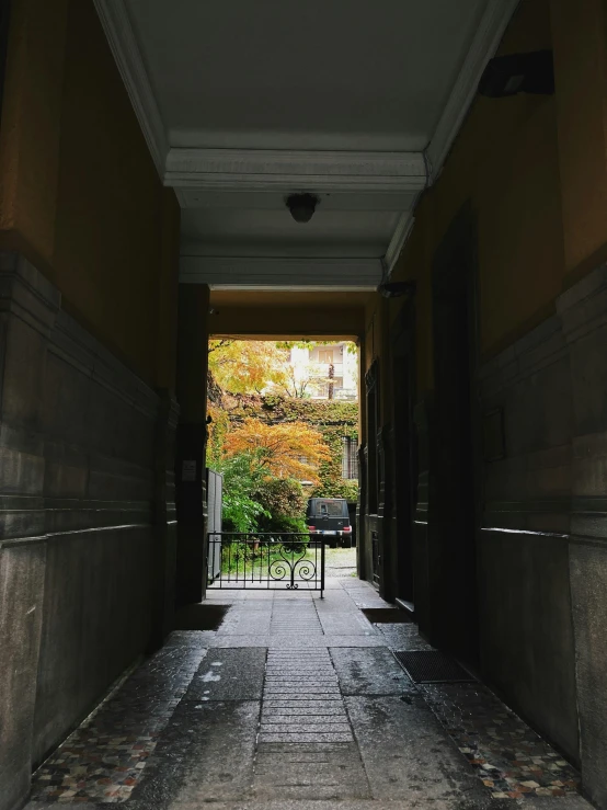 there is a door in the room that leads to an entry way