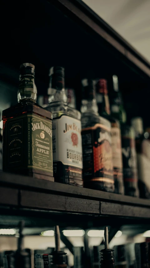 liquor bottles on shelves in the bar area