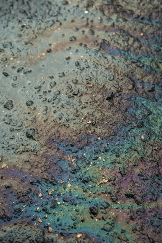 water on surface with yellow and purple dots