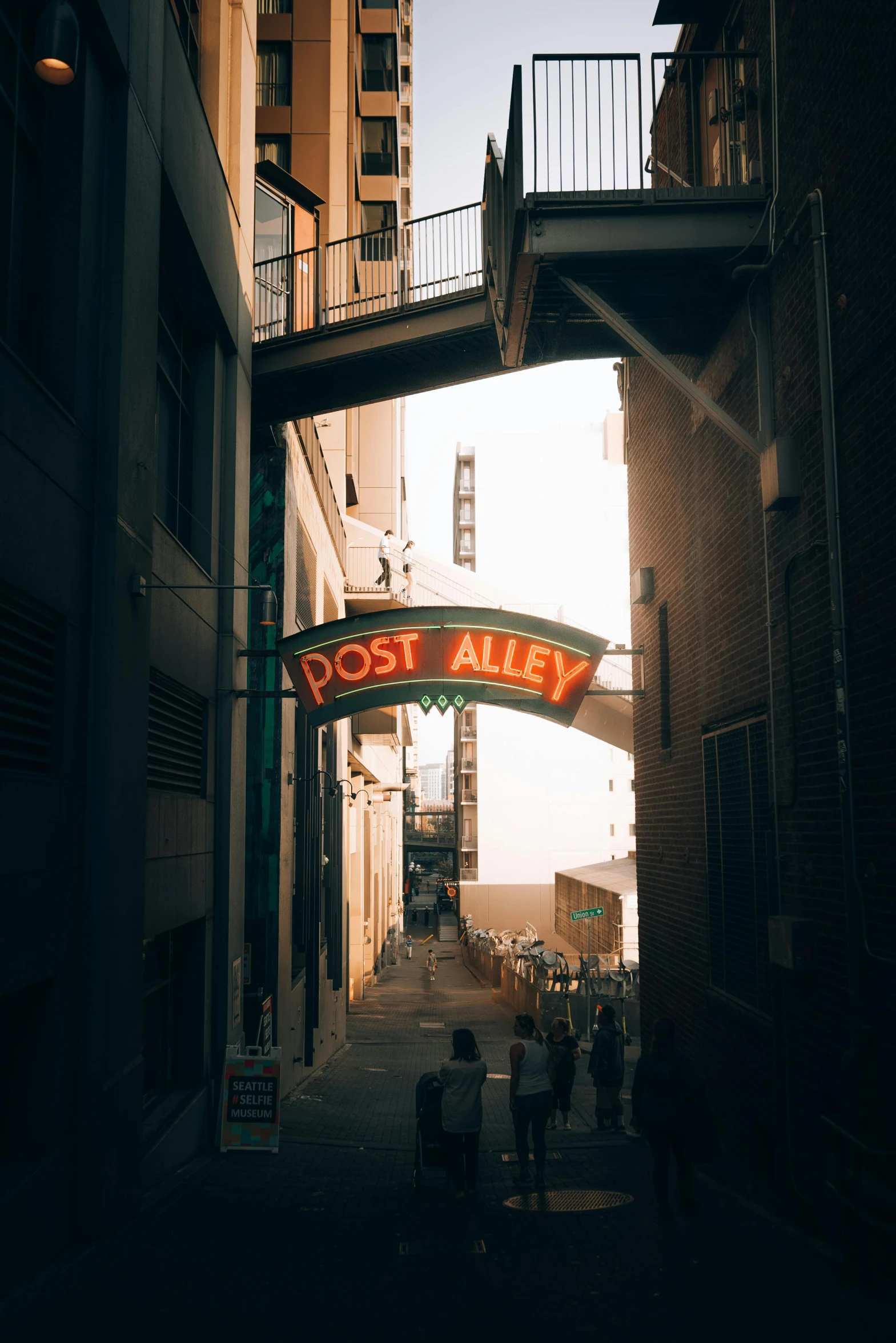 a street with a neon sign saying port ale on the side