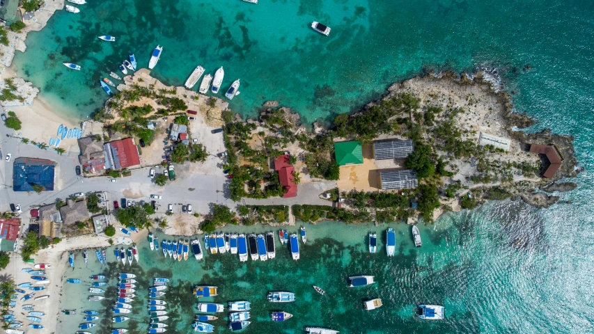 a harbor in an island with boats and buildings