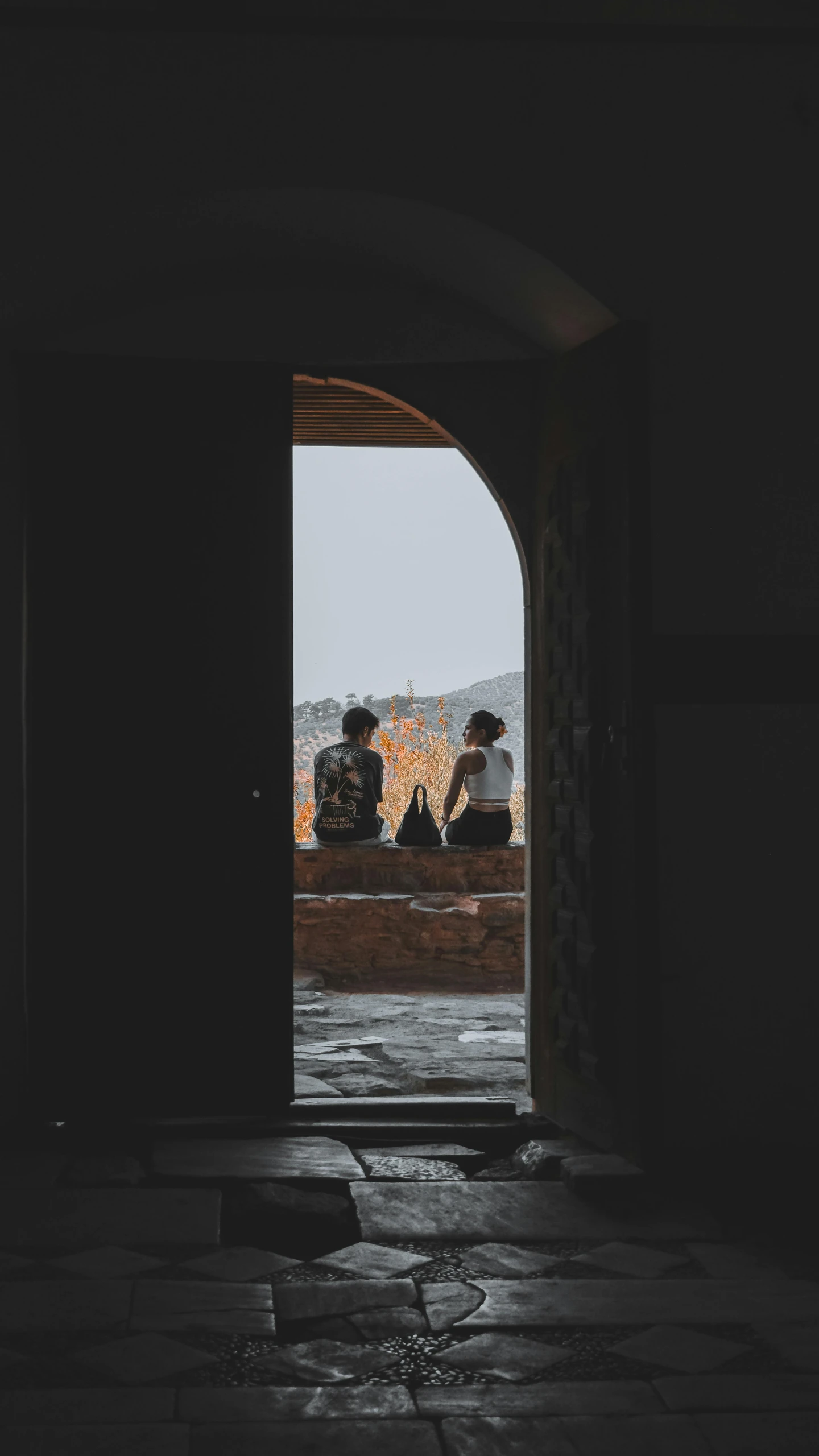 an open door revealing an entrance with a view of the outside