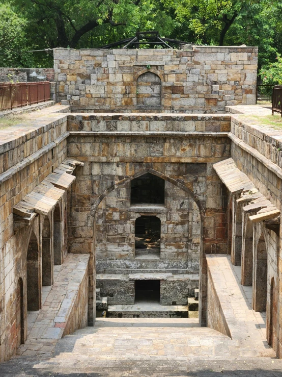 an outdoor furnace in an old stone structure