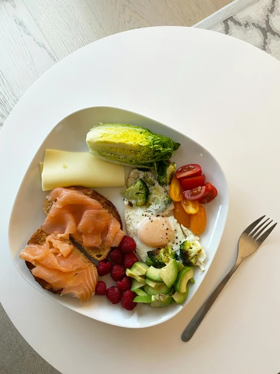 a plate with a fork and knife on it, ready to eat