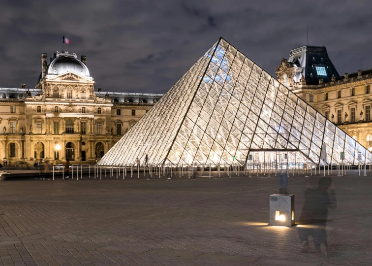 the pyramid of the building is lit up