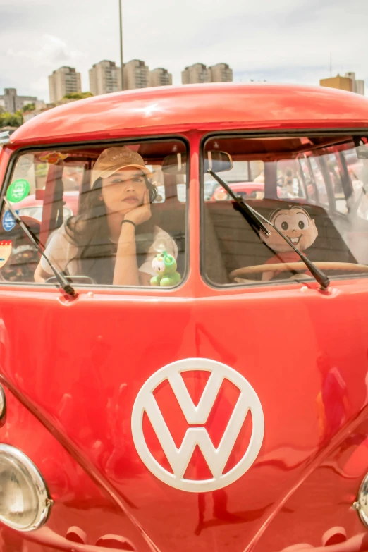 a person sitting in a volkswagen van