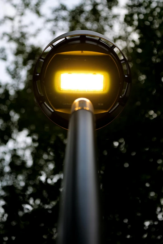 there is a light on the street pole