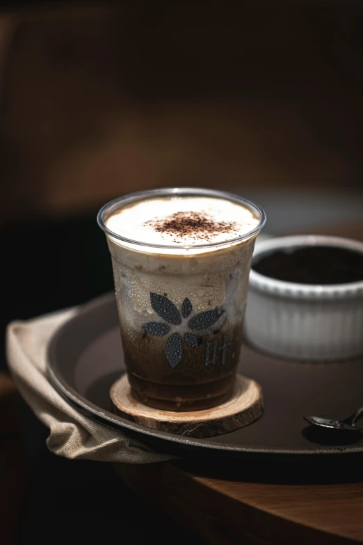 a close up of a  drink in a paper cup