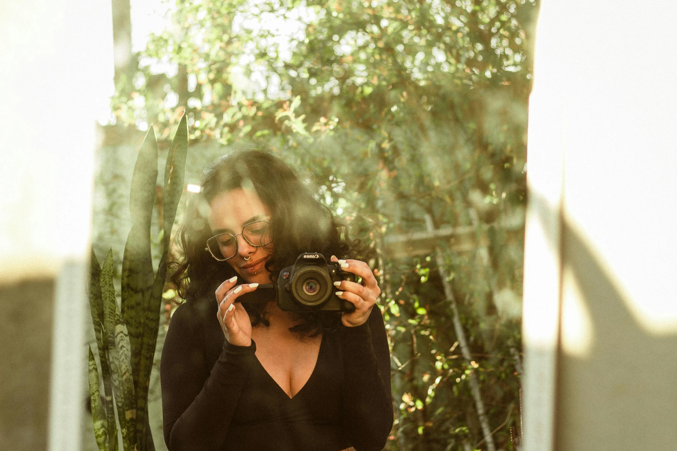 a woman is taking her picture in the mirror