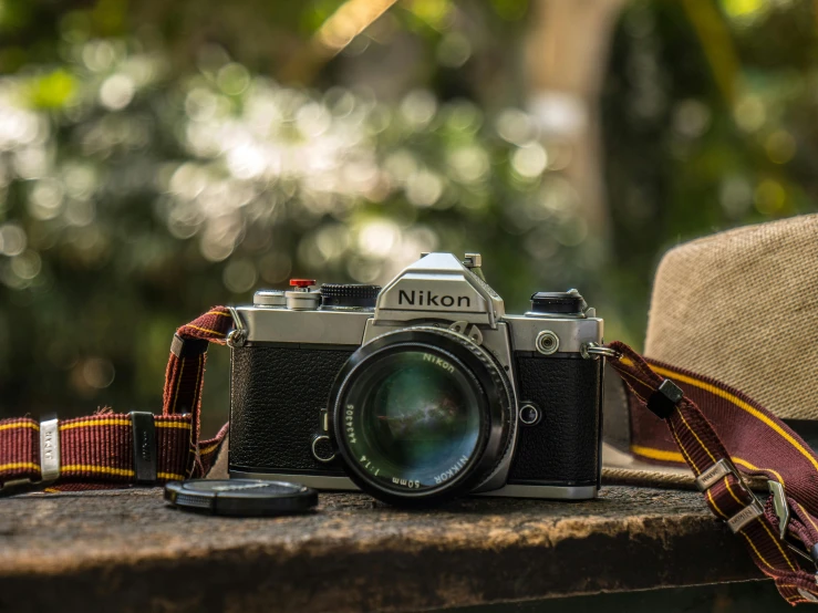 a close up of a camera sitting on a table