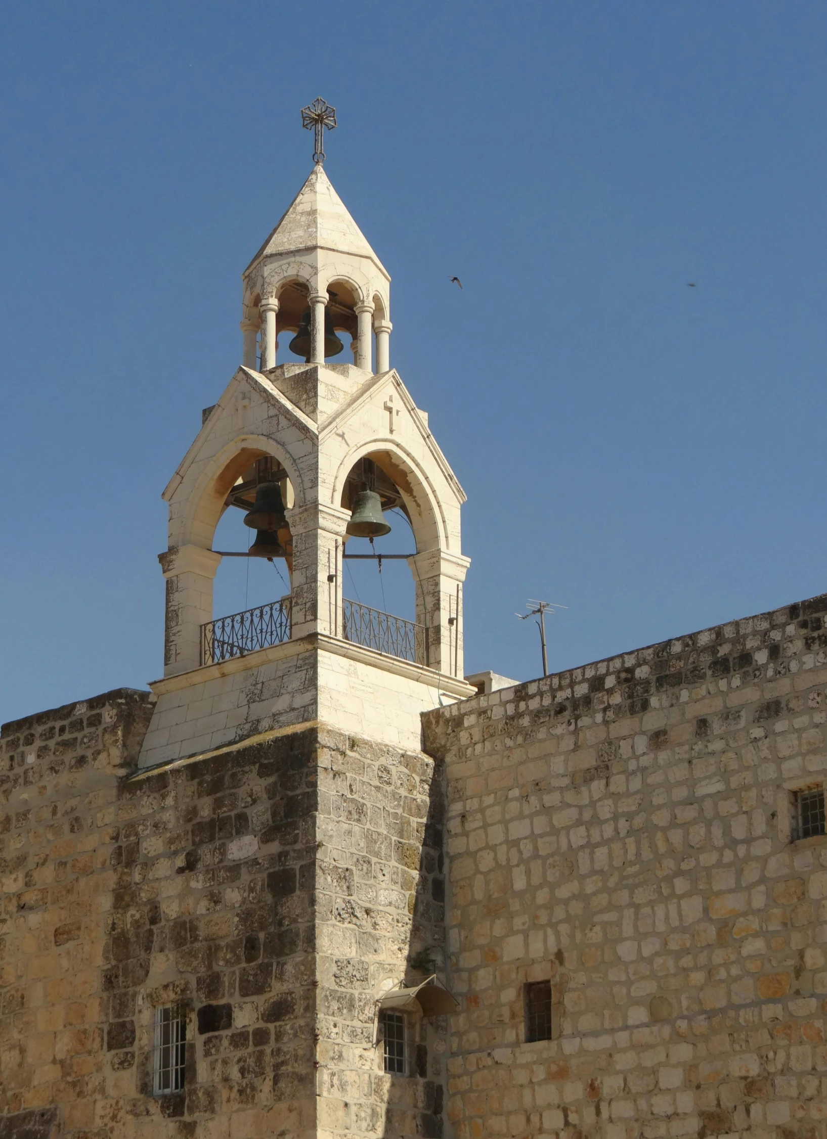 an old brick building with a bell tower