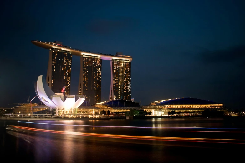 large buildings that are lit up at night