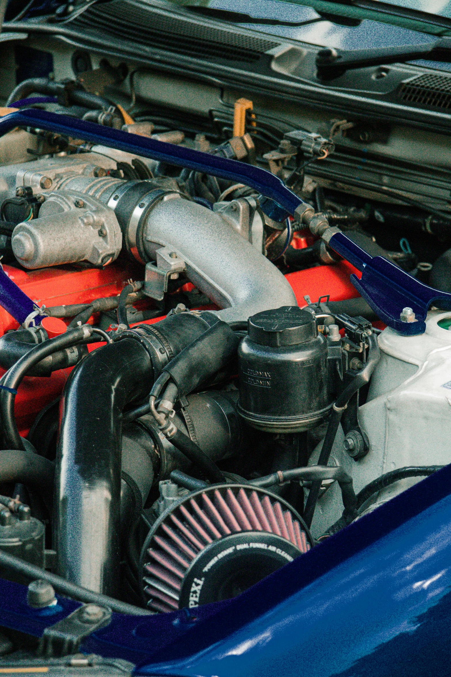 an image of engine compartment view for a car