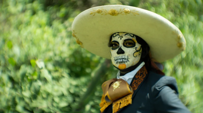 a man with a mexican skull painted on