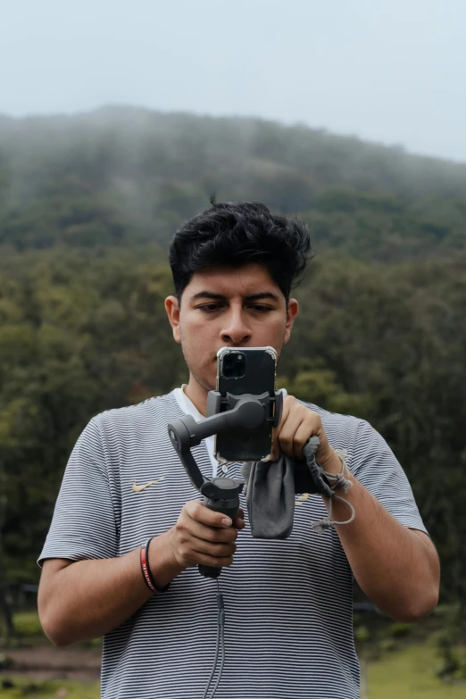 a man taking a po with his cell phone