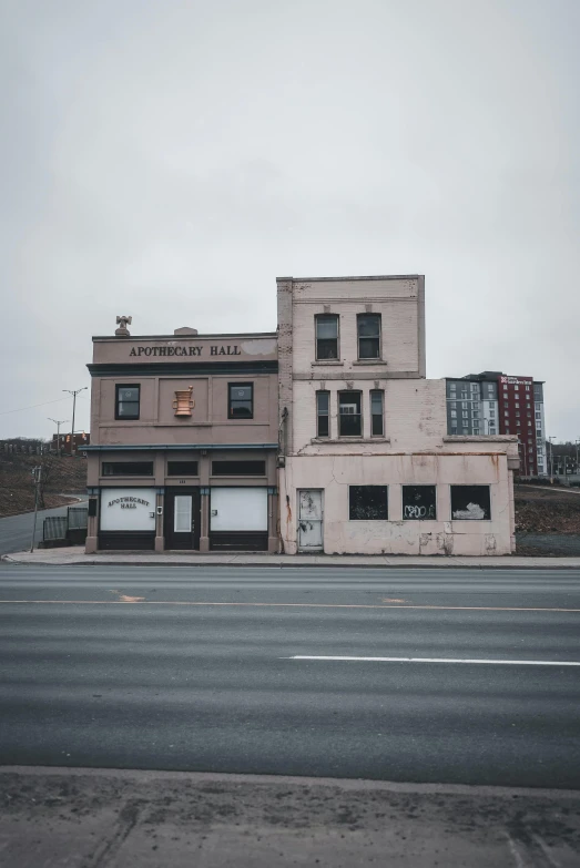 an old run down building with a few windows