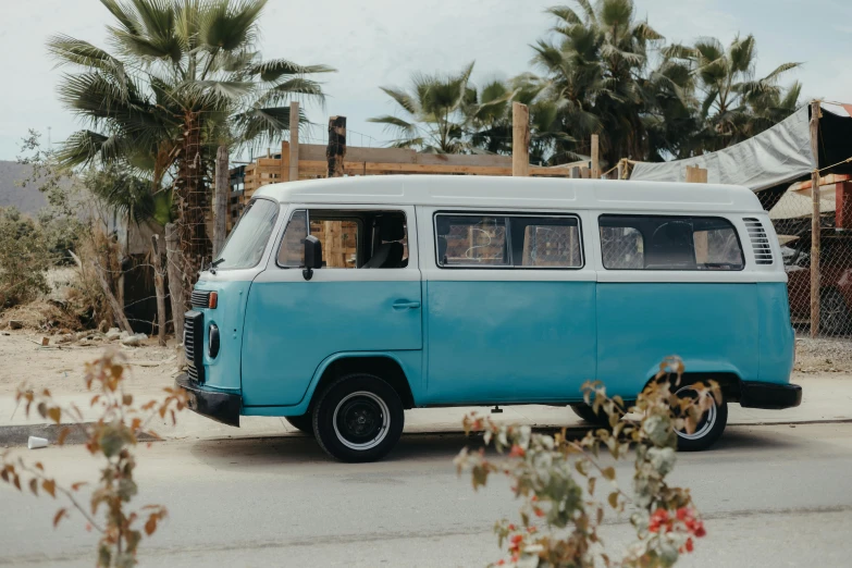 an old bus parked in the middle of a street