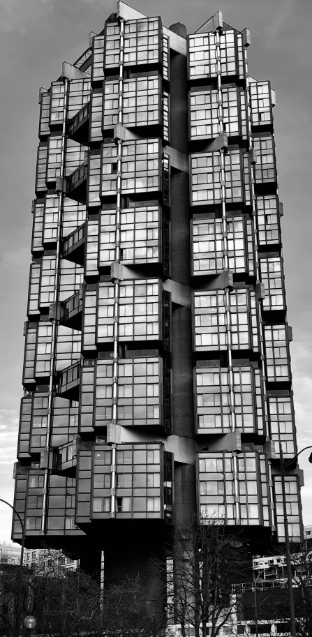 an old building with lots of windows against the sky