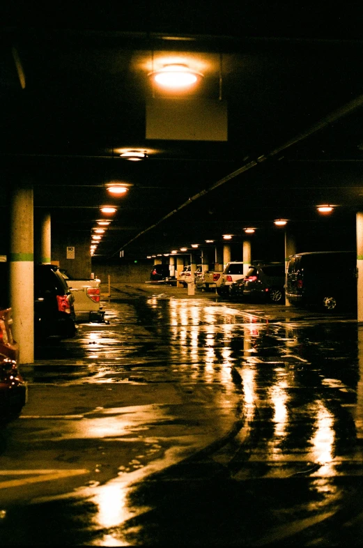 a wet parking garage during the day or night