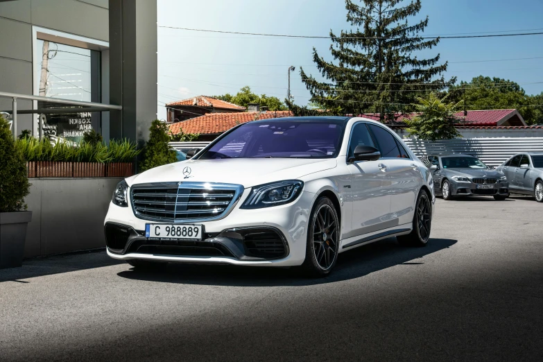 a white mercedes benz benz benz s w16