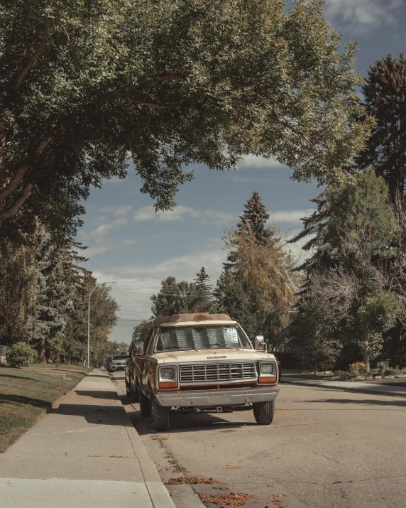 a pick up truck is parked in front of a house