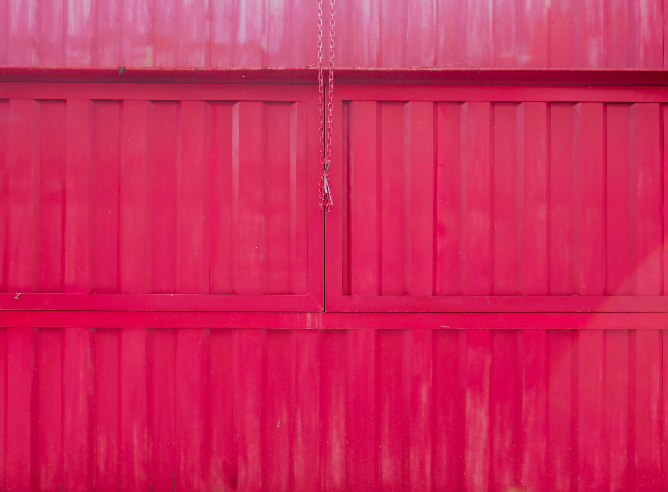 the color of the fence is bright pink