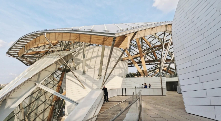 a building made from multiple materials, which look like a bird's nest