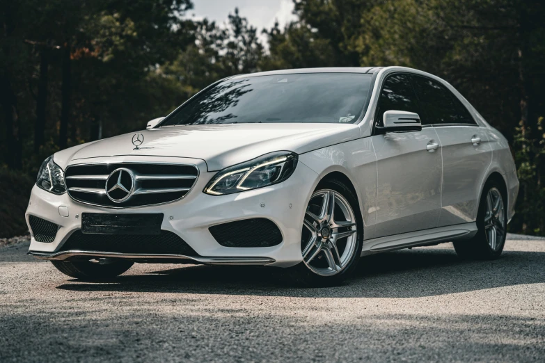 a mercedes benz e61 wagon with black rims