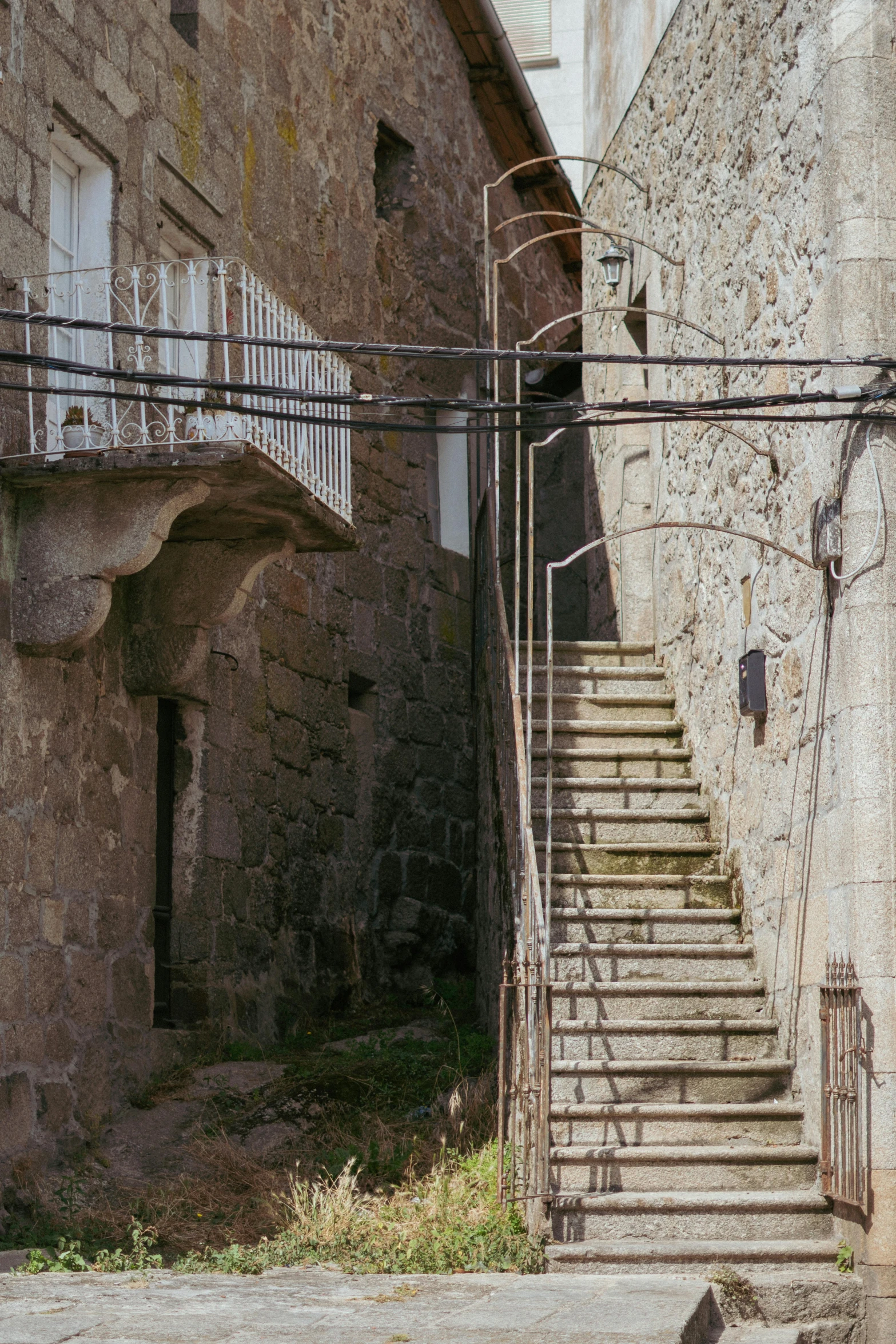 some stairs leading up to a brick building