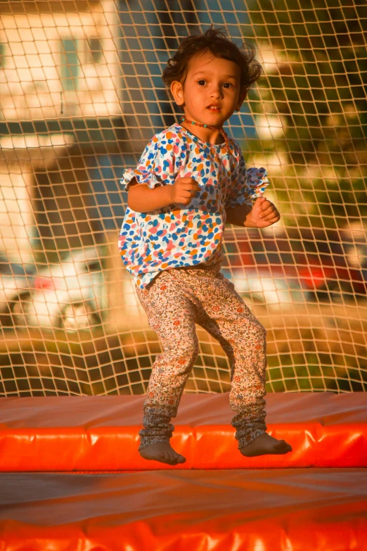 a  standing on top of a piece of plastic