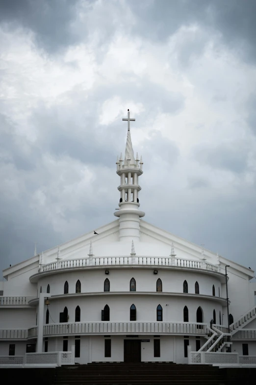 an image of a white church with an open roof