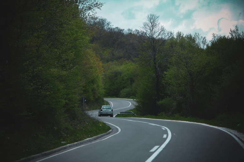 an empty road leading to the right