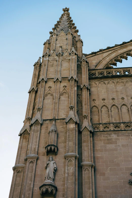 the top side of a church tower with clocks on it