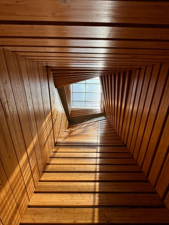 there is a wooden hallway in the building