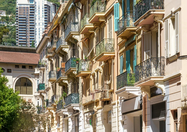 tall multi - story buildings with balconies and balconies on the balcony