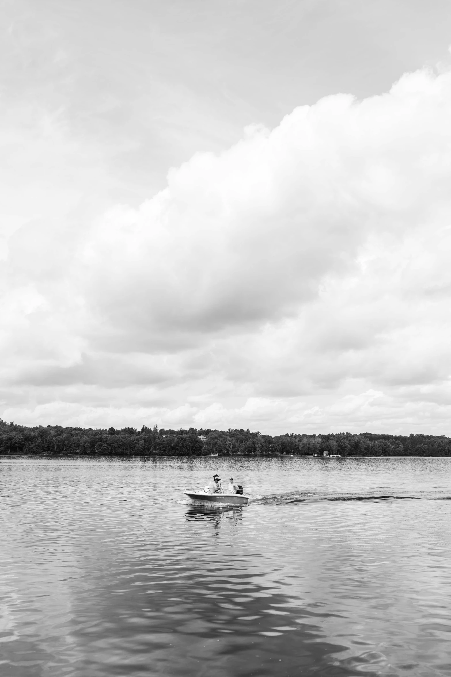 an image of people on a boat in the water