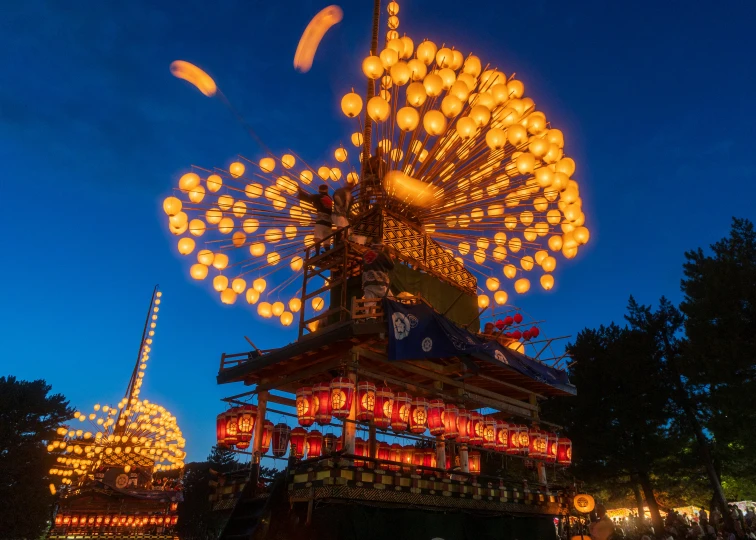 an ornate building with lights in the shape of fireworks