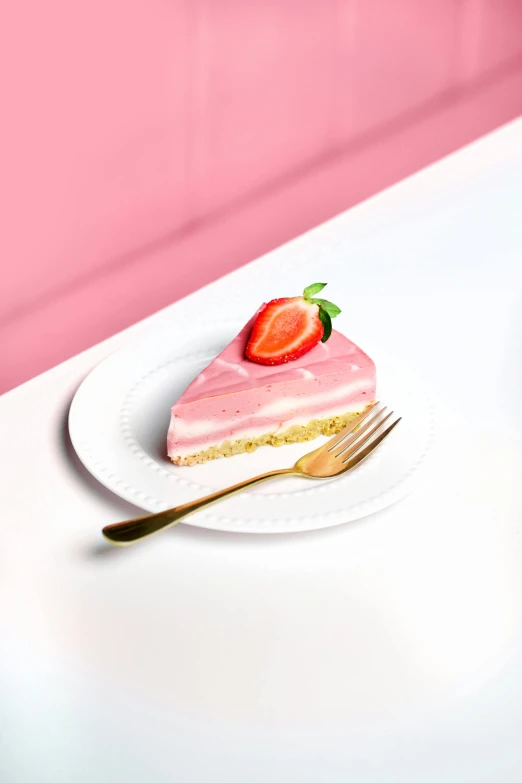 a slice of strawberry cheese cake on a plate