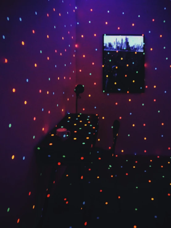an image of a tv in a room decorated with lights