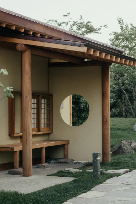 the outside of a house with large round windows