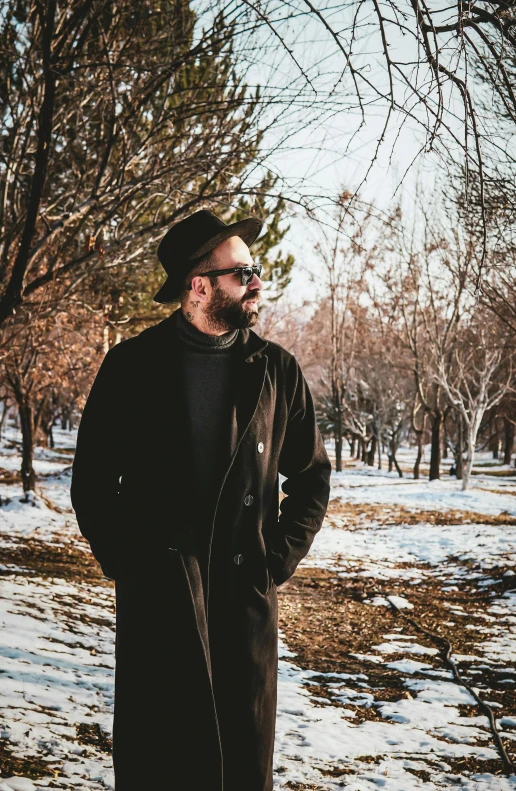 a man in winter gear is standing alone