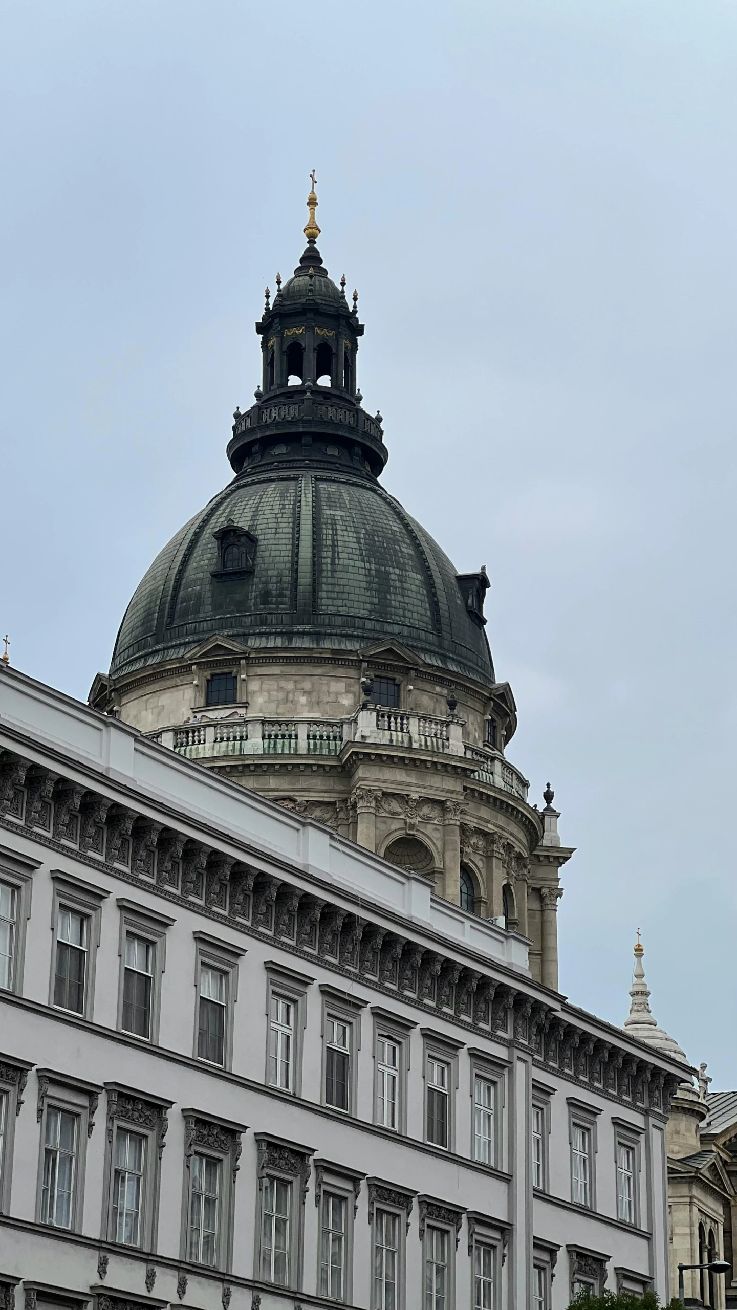 a white and black building with a large domed roof