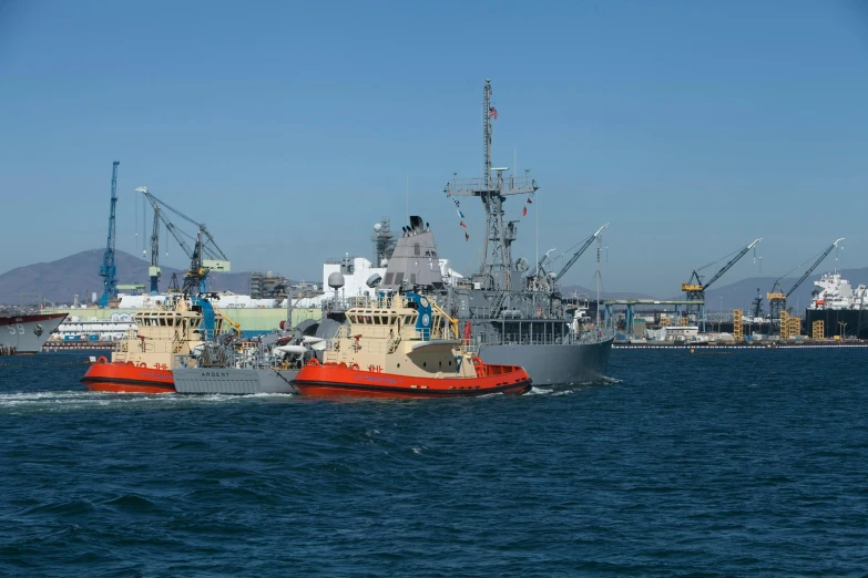 two boats are next to each other in the water